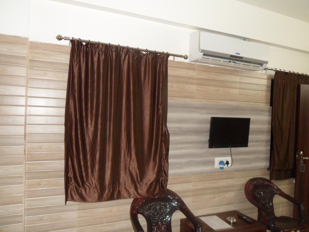 Hotel Madhusudan Dwārka Oda fotoğraf