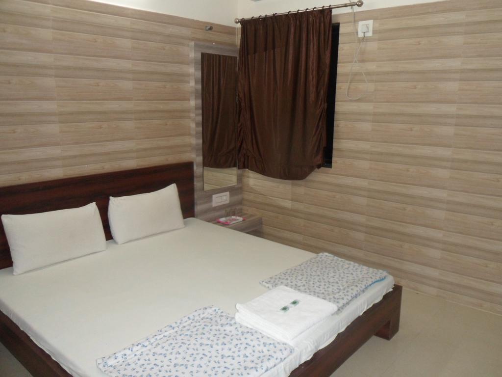 Hotel Madhusudan Dwārka Oda fotoğraf